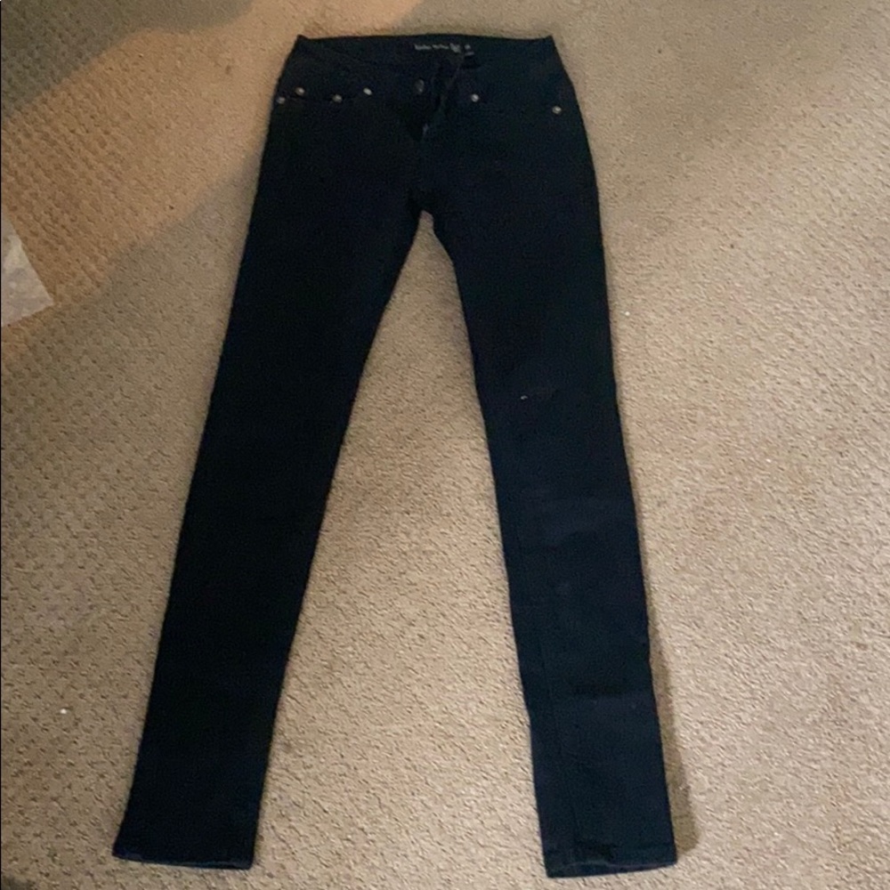 Plain black skinny jeans, size 25